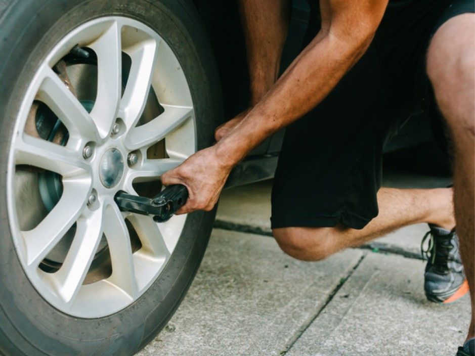 man-changing-tire